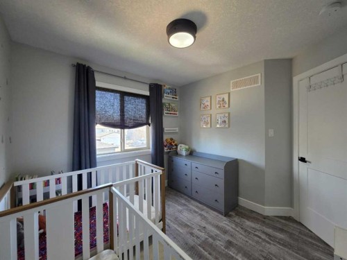 908 8 Avenue, Wainwright, AB - Indoor Photo Showing Bedroom