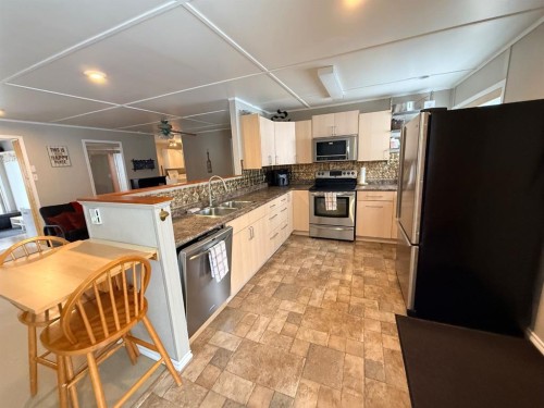 1313 Kewatin, Turtle Lake, SK - Indoor Photo Showing Kitchen With Double Sink