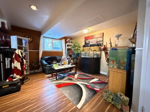 5709 40 Street, Lloydminster, AB - Indoor With Fireplace