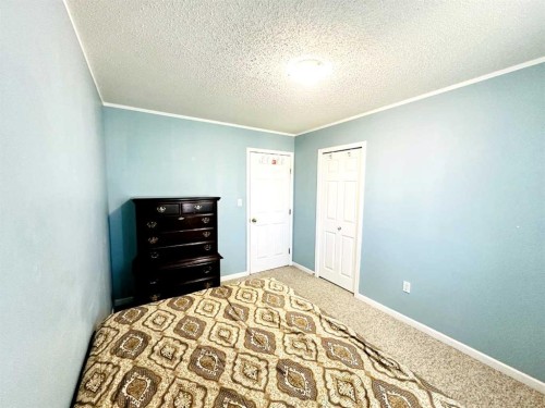 1105 19 Street, Wainwright, AB - Indoor Photo Showing Bedroom