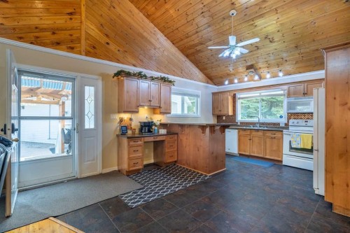 1103 Marblo Place, Brightsand Lake, SK - Indoor Photo Showing Kitchen With Double Sink