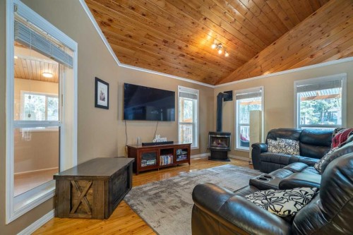 1103 Marblo Place, Brightsand Lake, SK - Indoor Photo Showing Living Room With Fireplace