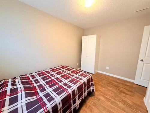 2820 12 Avenue, Wainwright, AB - Indoor Photo Showing Bedroom