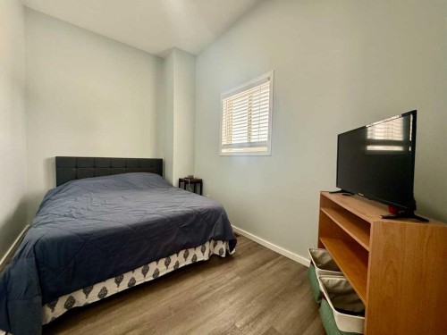 702 10 Avenue, Wainwright, AB - Indoor Photo Showing Bedroom