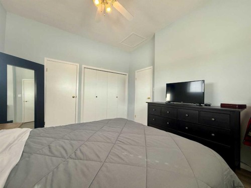 702 10 Avenue, Wainwright, AB - Indoor Photo Showing Bedroom