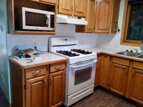 702 10 Avenue, Wainwright, AB - Indoor Photo Showing Kitchen