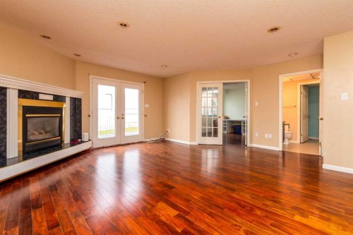 2706 57B Avenue, Lloydminster, AB - Indoor Photo Showing Living Room With Fireplace