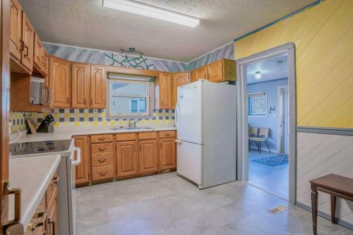 4716 52 Avenue, Vermilion, AB - Indoor Photo Showing Kitchen With Double Sink