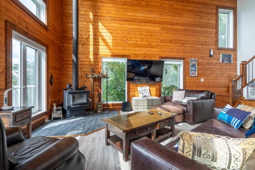 Lot 66 Sandy Beach Regional Park, Sandy Beach (Sask), SK - Indoor Photo Showing Living Room With Fireplace