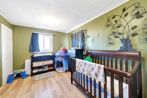 Pt Ne 03-48-27-W3, Rural, SK - Indoor Photo Showing Bedroom