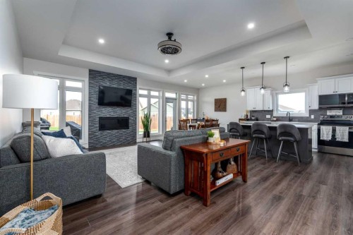 7302 37 Street Close, Lloydminster, AB - Indoor Photo Showing Living Room With Fireplace