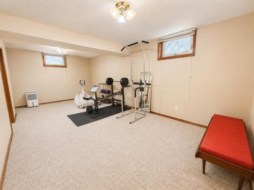 614 6 Avenue, Wainwright, AB - Indoor Photo Showing Gym Room