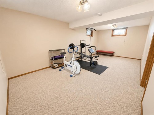 614 6 Avenue, Wainwright, AB - Indoor Photo Showing Gym Room