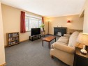 614 6 Avenue, Wainwright, AB  - Indoor Photo Showing Living Room With Fireplace 