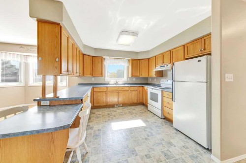 16 1St Street West, Neilburg, SK - Indoor Photo Showing Kitchen With Double Sink