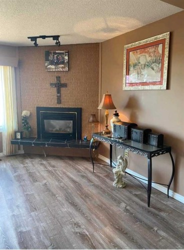 49425 Hwy 870, Innisfree, AB - Indoor With Fireplace