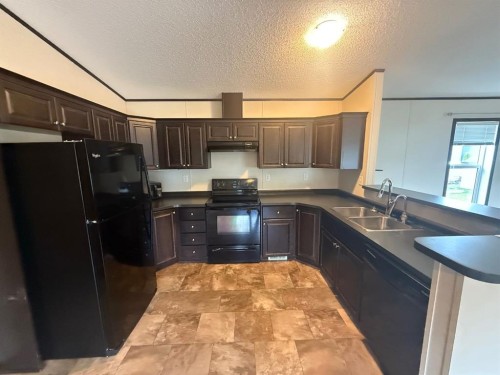 240 Main Street, Mervin, SK - Indoor Photo Showing Kitchen With Double Sink