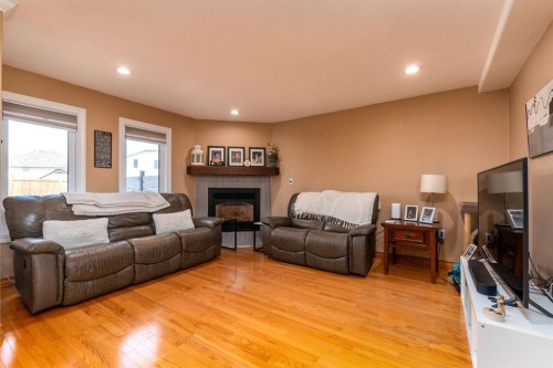 4005 60Th Avenue, Lloydminster, AB - Indoor Photo Showing Living Room With Fireplace