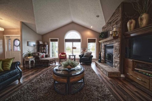 451066 Rge Rd 73, Rural Wainwright No. 61, M.D. Of, AB - Indoor Photo Showing Living Room With Fireplace