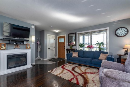 Unit 7-3390 72 Avenue, Lloydminster, AB - Indoor Photo Showing Living Room With Fireplace