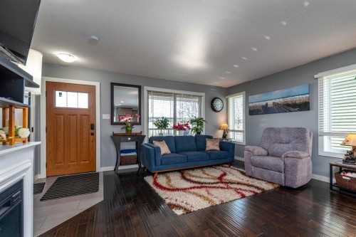 Unit 7-3390 72 Avenue, Lloydminster, AB - Indoor Photo Showing Living Room With Fireplace