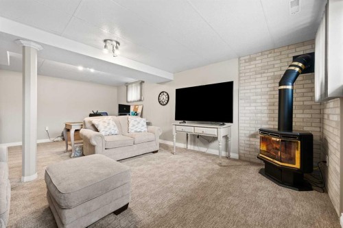 5609 35 Street, Lloydminster, AB - Indoor Photo Showing Other Room With Fireplace