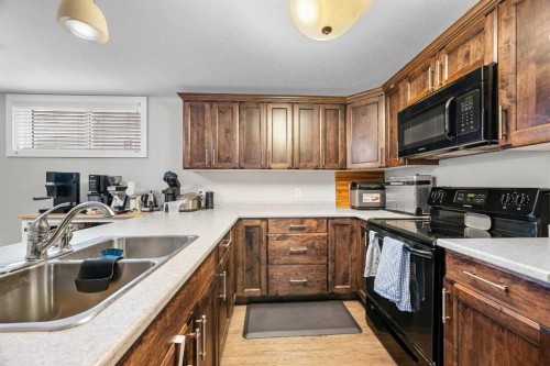 6015 18 Street, Lloydminster, AB - Indoor Photo Showing Kitchen With Double Sink