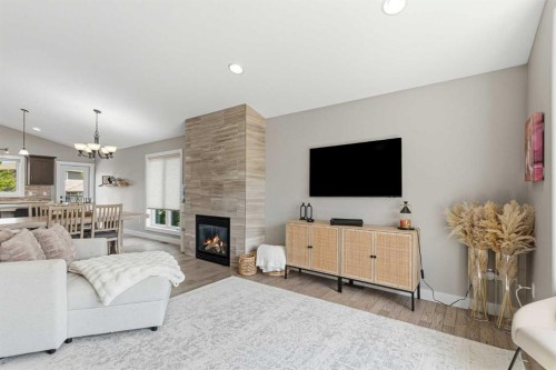 33-2715 73 Avenue, Lloydminster, AB - Indoor Photo Showing Living Room With Fireplace