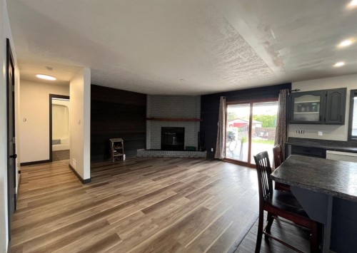 1005 15 Street, Wainwright, AB - Indoor With Fireplace