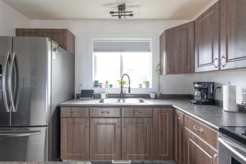 307 7 Avenue, Paradise Hill, SK - Indoor Photo Showing Kitchen With Double Sink