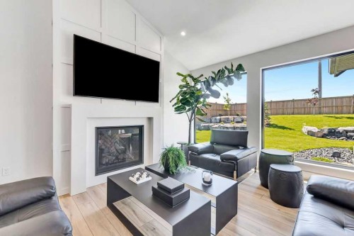 5913 13 Street, Lloydminster, AB - Indoor Photo Showing Living Room With Fireplace
