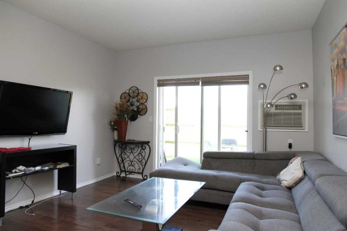 102B-6608 42 Street, Lloydminster, AB - Indoor Photo Showing Living Room