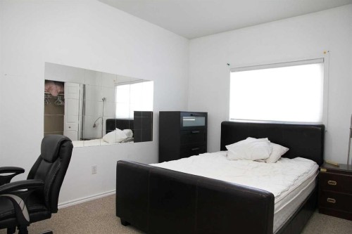 102B-6608 42 Street, Lloydminster, AB - Indoor Photo Showing Bedroom