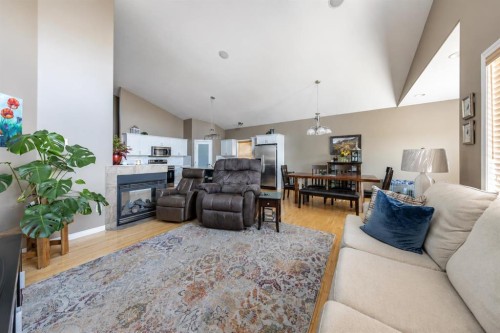 3808-63A Ave Close, Lloydminster, AB - Indoor Photo Showing Living Room With Fireplace