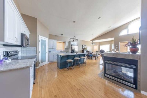 3808-63A Ave Close, Lloydminster, AB - Indoor Photo Showing Other Room With Fireplace