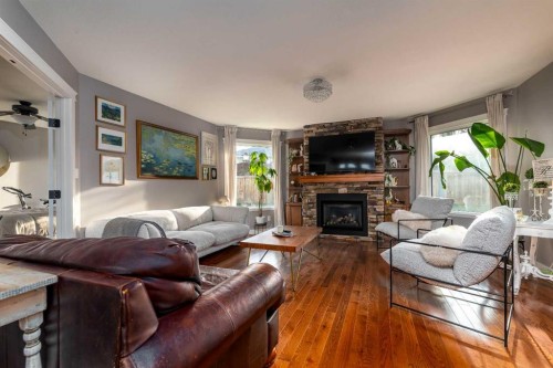 3610 63 Avenue Close, Lloydminster, AB - Indoor Photo Showing Living Room With Fireplace