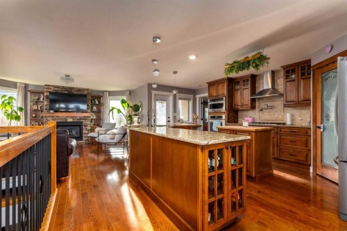 3610 63 Avenue Close, Lloydminster, AB - Indoor Photo Showing Kitchen With Fireplace