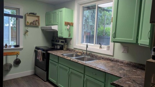 5028 52 Street, Provost, AB - Indoor Photo Showing Kitchen With Double Sink