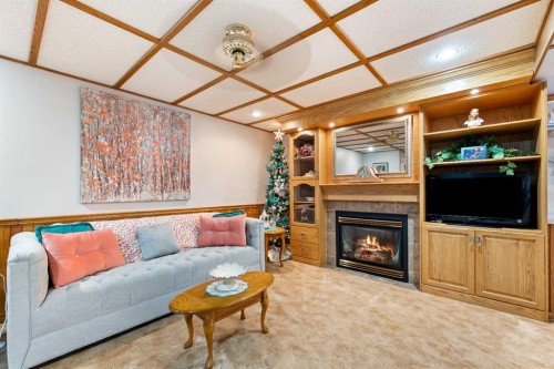 5703 35 Street, Lloydminster, AB - Indoor Photo Showing Living Room With Fireplace
