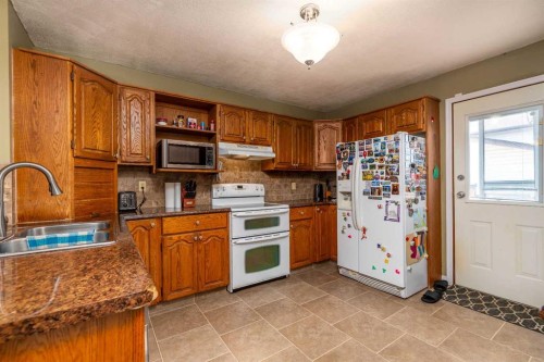 2604 57 A Avenue, Lloydminster, AB - Indoor Photo Showing Kitchen With Double Sink