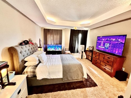 2826 12 Avenue, Wainwright, AB - Indoor Photo Showing Bedroom