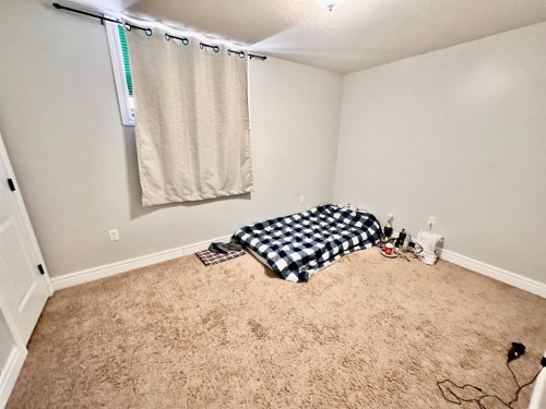 2826 12 Avenue, Wainwright, AB - Indoor Photo Showing Bedroom