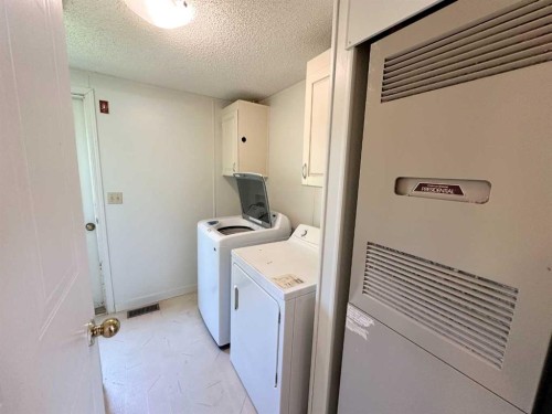 5001 51 Street, Clandonald, AB - Indoor Photo Showing Laundry Room