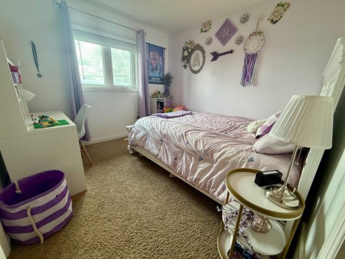 4905 5 Avenue, Chauvin, AB - Indoor Photo Showing Bedroom