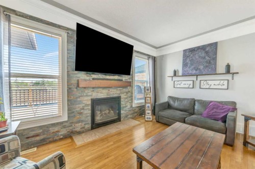 407 1 Avenue Nw, Waseca, SK - Indoor Photo Showing Living Room With Fireplace