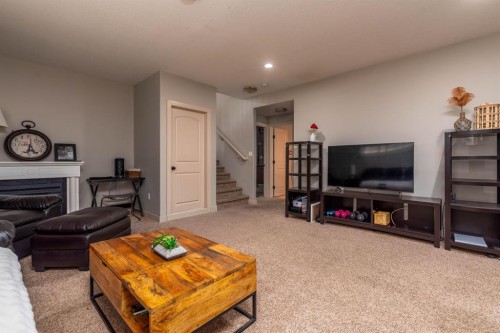 3802 74 Avenue, Lloydminster, AB - Indoor Photo Showing Living Room With Fireplace