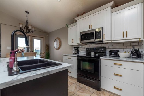 3802 74 Avenue, Lloydminster, AB - Indoor Photo Showing Kitchen With Double Sink