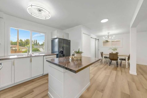 5410 46Th Street, Lloydminster, AB - Indoor Photo Showing Kitchen With Double Sink