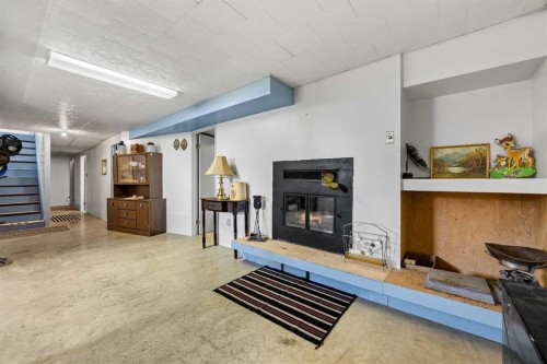 32037 Twp 504, Kitscoty, AB - Indoor With Fireplace