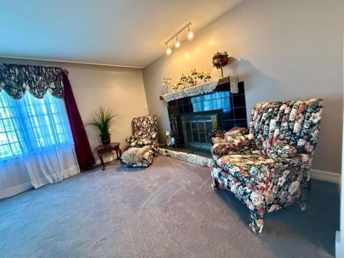 1037 4 Avenue, Wainwright, AB - Indoor With Fireplace